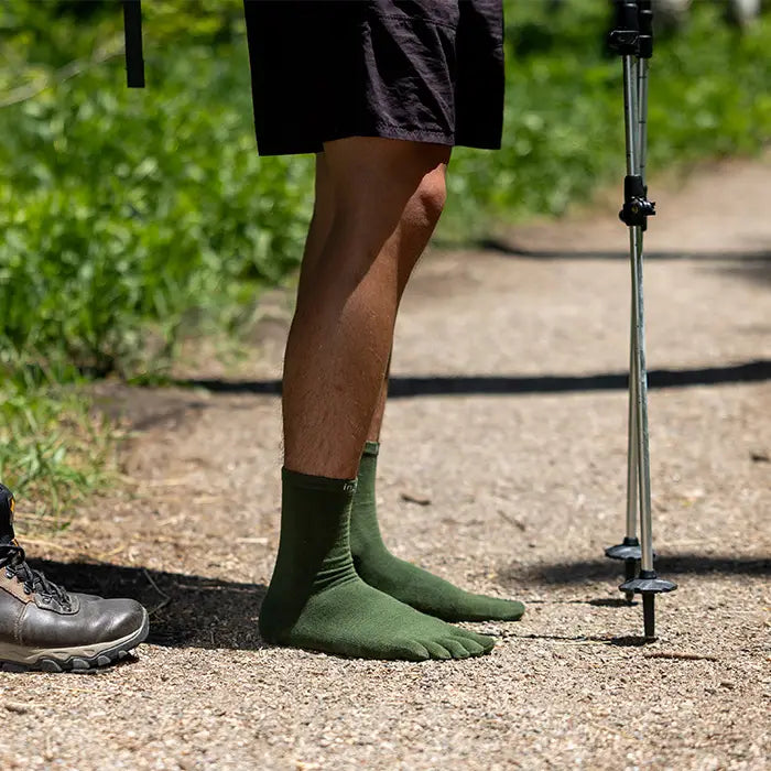 Injinji Liner Crew Wool Forest model wearing outdoors