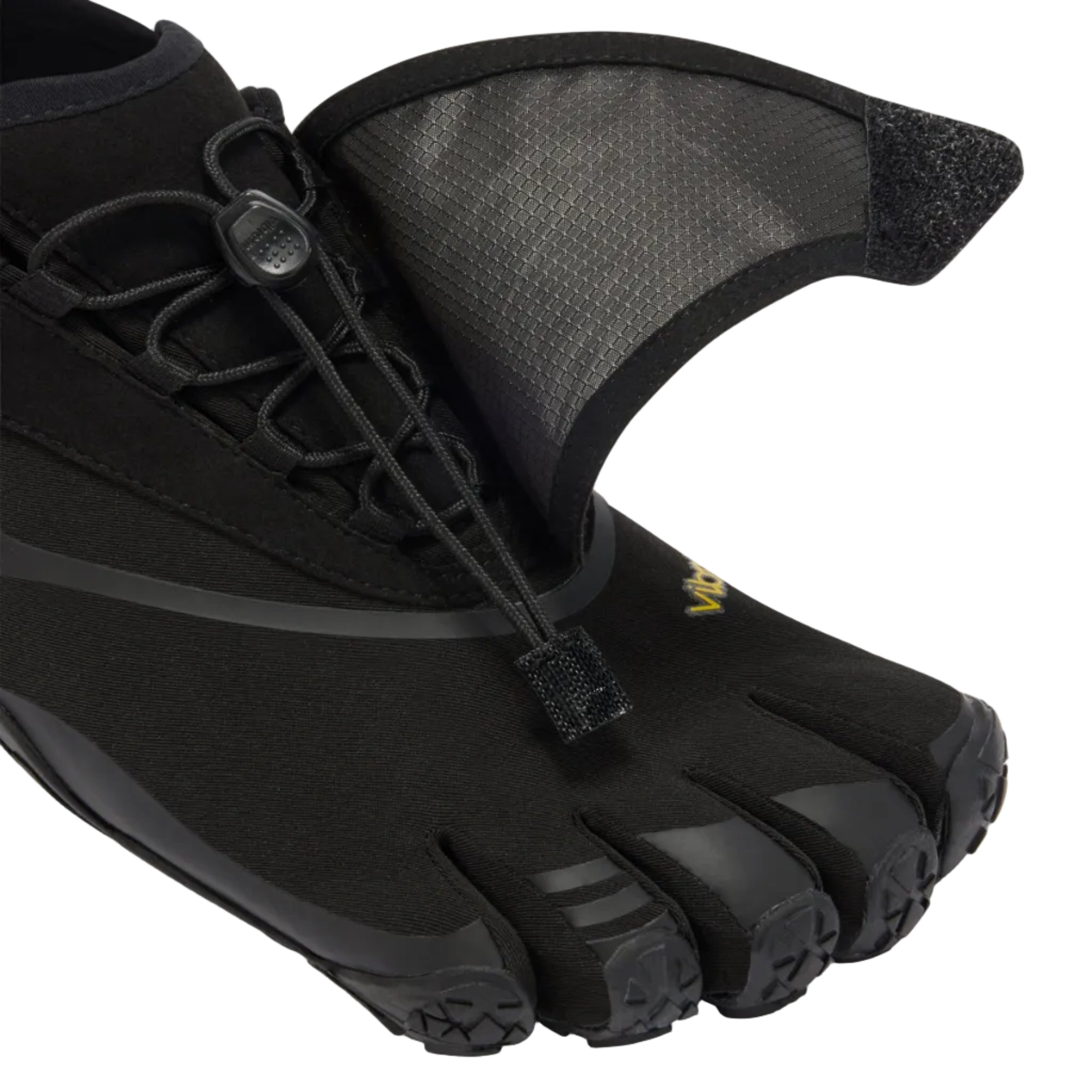Close-up of a black Vibram minimalist Trail toe shoe with a velcro strap closure and a small yellow logo on the side, set against a light gray background.